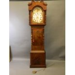 An early C19th Lancashire inlaid figured mahogany longcase clock with arched dial, moon phase, and