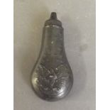 An American pewter powder flask with raised eagle and star decoration, 4'' long