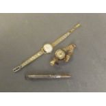 Two 9ct gold lady's wristwatches, and a sterling silver propelling pencil and fountain pen