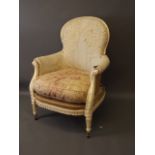 A late C19th French armchair with carved and painted beechwood frame, upholstery AF