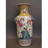 A Chinese enamelled porcelain vase decorated with a peacock amongst a flowering tree and rockwork, 6