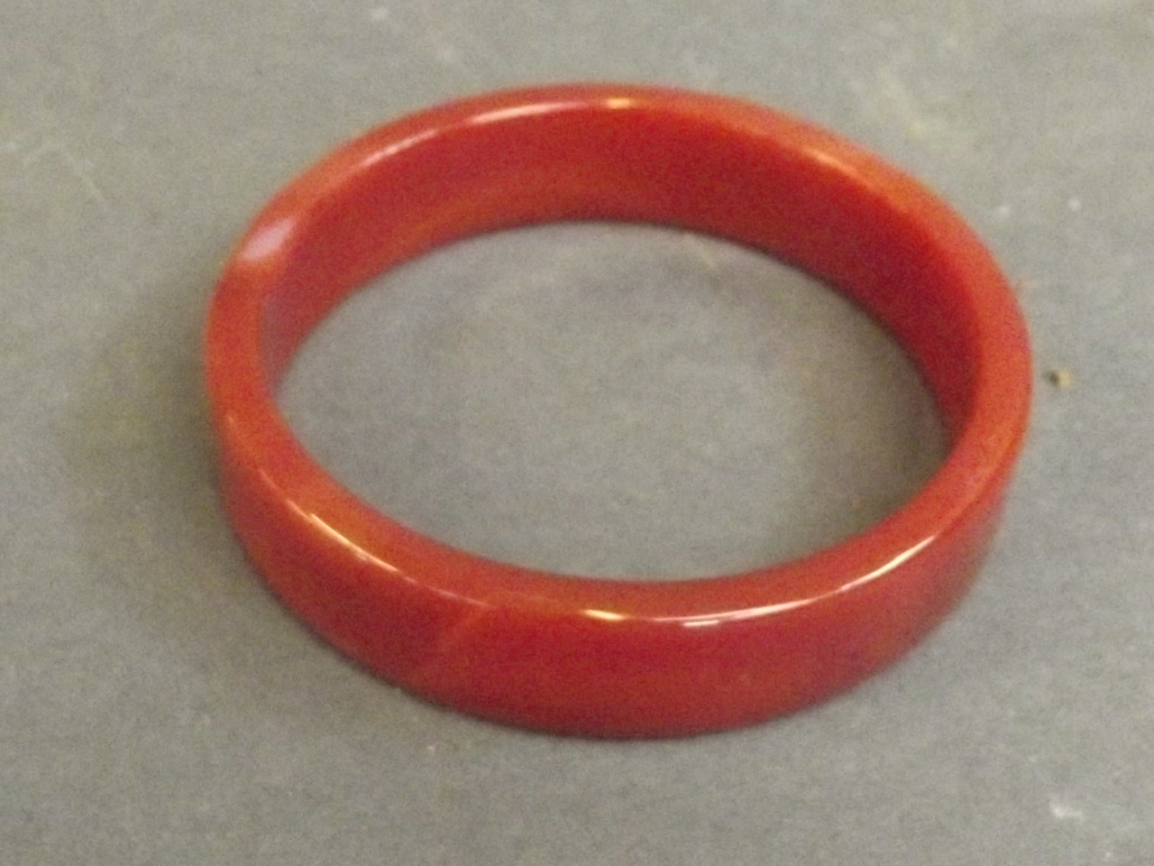 A reconstituted amber bangle, 3'' diameter, Best Bid