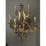 A good C19th French ormolu bronze ten branch chandelier, converted to electricity, with shades,