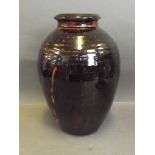 A Studio pottery vase with a brown glaze, 11'' high