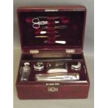 A vanity box with chrome plated containers and leather top, 11'' long