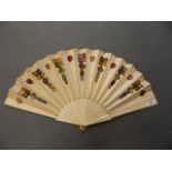 A Japanese bone fan with silk embroidered decoration, 13'' long