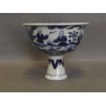 A Chinese blue and white stem cup decorated with figures in a garden, 4½'' high