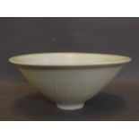 A Chinese celadon bowl with raised petal decoration, 6'' diameter