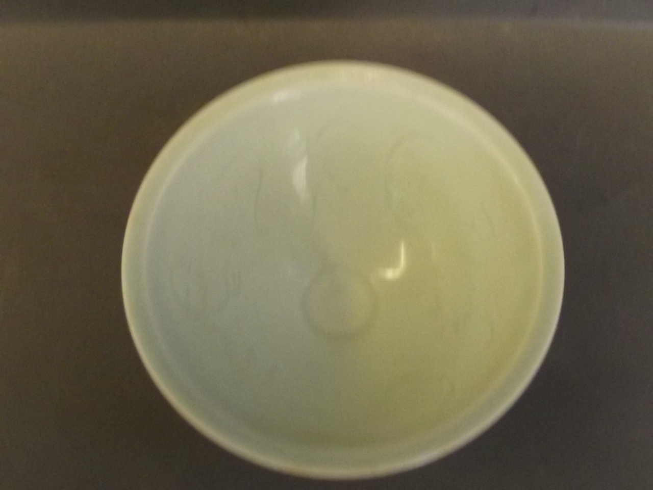 A Chinese celadon bowl with raised petal decoration, 6'' diameter - Image 2 of 2