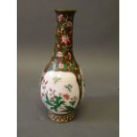 A Cantonese enamel bottle vase decorated with birds and butterflies amongst flowers, 10½'' high