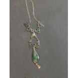 A silver and enamel Art Nouveau style pendant necklace