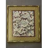 A framed Chinese silk embroidery of bats, lotus flowers and fruit, 9'' x 10''