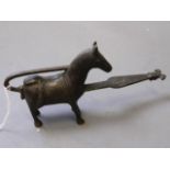 An Eastern bronze padlock with key in the form of a pony, 6'' long