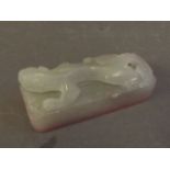 A small jade seal carved with a Fo dog to top, 2½'' long