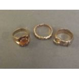 Three 9ct gold rings, one set with a semi-precious stone, 8g