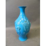 A good Chinese blue glazed vase with relief decoration of five goats with inscriptions written in