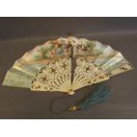 A C19th French ivory, silver and gilt inlaid fan with classical painted subject and gold leaf