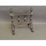 A brass poker rest, 8½'' wide, Best Bid