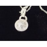A silver and cubic zirconia set pendant necklace