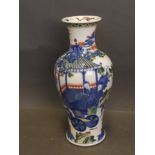 A Chinese Doucai vase decorated with figures in a garden and bats, 6 character mark to base, 9''