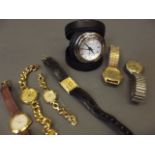 Four lady's wristwatches, a gentleman's Alba wristwatch, a Penhaligon's travelling alarm clock in