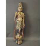 A late C18th/early C19th Chinese softwood carved figure of Quan Yin holding a pearl, with polychrome