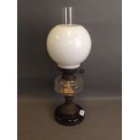A Victorian oil lamp with glass reservoir and a 'Hinks no.2 Duplex' burner, 21'' high
