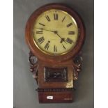 A Victorian inlaid walnut drop dial wall clock with, spring driven movement striking on a bell, dial