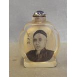 A Peking glass snuff bottle decorated with calligraphy and a portrait of a gentleman, 2½'' high
