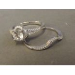A silver dress ring and matching eternity ring, size V