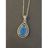 A silver and opalite pendant necklace
