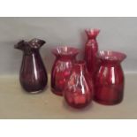 A Dartington mauve glass frilled neck vase, and a quantity of Cranberry glass vases, 8'' high