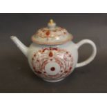 A Chinese teapot with iron red decoration, 5½'' high (AF)