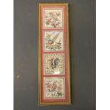 A mounted and framed set of four hand painted tiles decorated with birds, each 6'' square, frame 9''