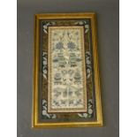 A fine Chinese embroidered silk depicting butterflies, vases, and scholar's equipment, 12½'' x 25½''