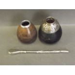 A white metal powder shaker, and two engraved gourd shaped vases with metal collars, 7½'' long