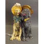 A cold painted bronze figure of two dogs, 7'' high