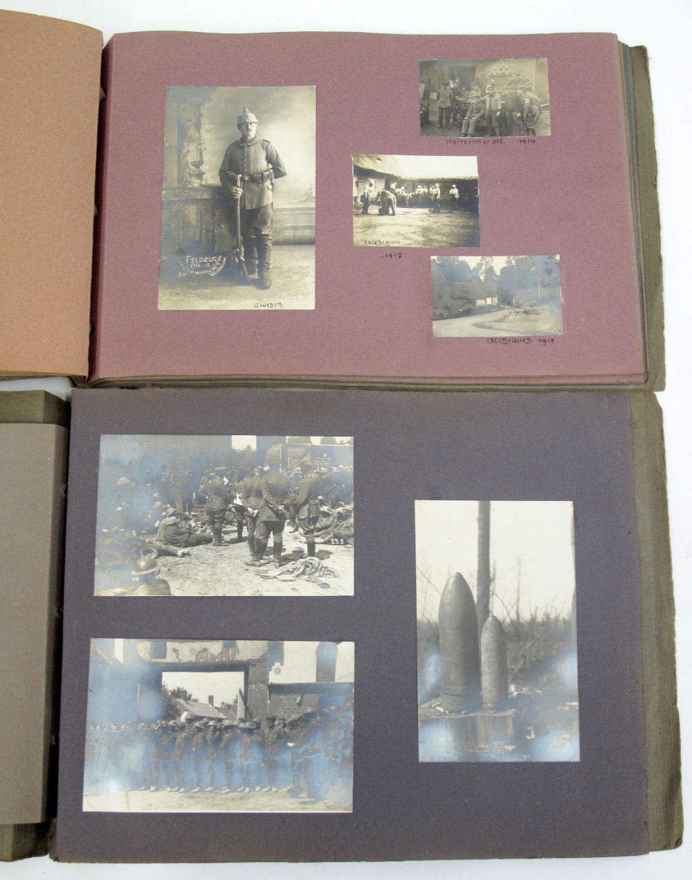 Imperial German Photograph Album Pair, the albums consist of snapshot photographs and postcards. The