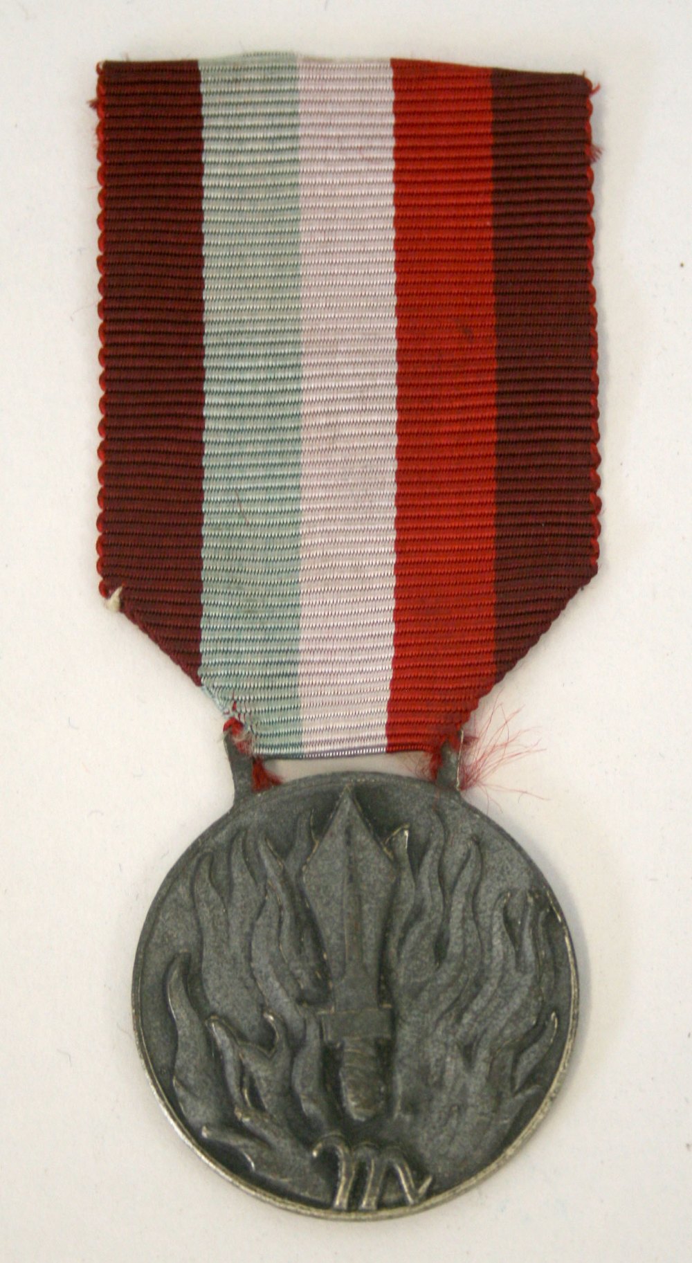 Italian National Fire Fighters Merit Medal silver grade, complete with the ribbon.