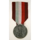 Italian National Fire Fighters Merit Medal silver grade, complete with the ribbon.