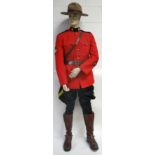 Royal Canadian Mounted Police (RCMP) Full Uniform consisting of red tunic with gilt metal queens