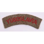 WW2 Yugoslavia Nationality Shoulder Title being an embroidered example with red lettering on khaki