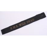 Royal Navy Cap Tally HMS WILD SWAN, gold wire embroidered on black ribbon. WW2 period example with