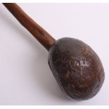 Zulu Warriors Knobkerrie of hard wood with bulbous ball end. The end has been carved BOER 1899,