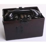 German Army Field Telephone, complete with the Bakelite case and remains in good overall condition.