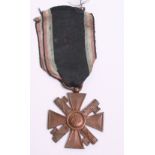 Italian Fascist MSVN 10 Year Service Cross, complete with the original ribbon and remaining in