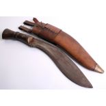 1917 Dated Gurkha Kukri complete with its original brown leather field service scabbard. Wood grip