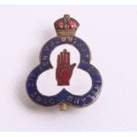 Young Citizen Volunteers of Ireland Badge in gilt and enamel. Centre of the badge has the red hand