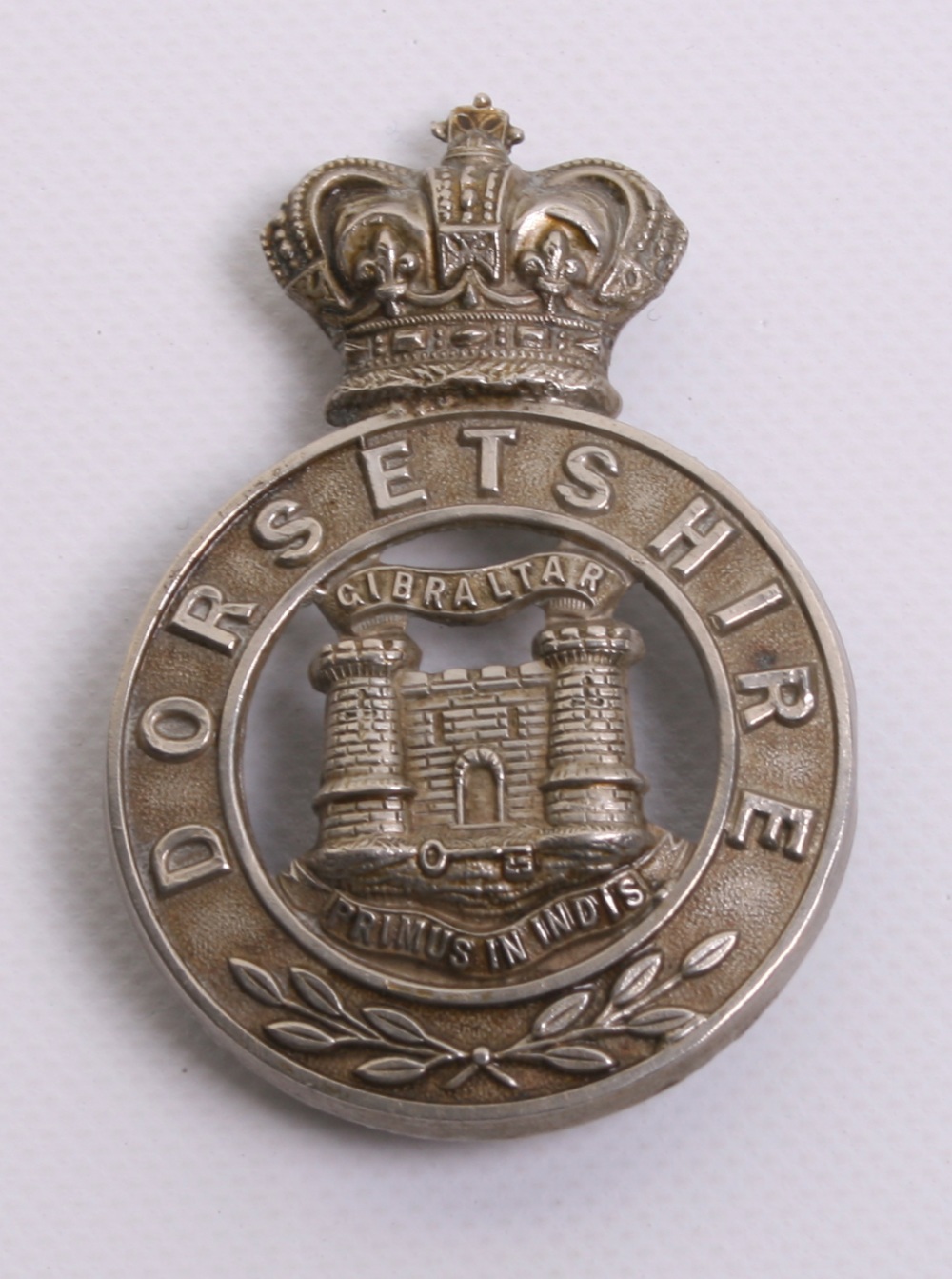 Victorian Dorsetshire Militia Glengarry Badge of white metal with two loops to the reverse, top loop