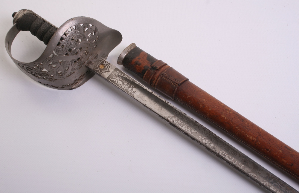 British George V 1897 Pattern Officers Sword complete with its original brown leather field